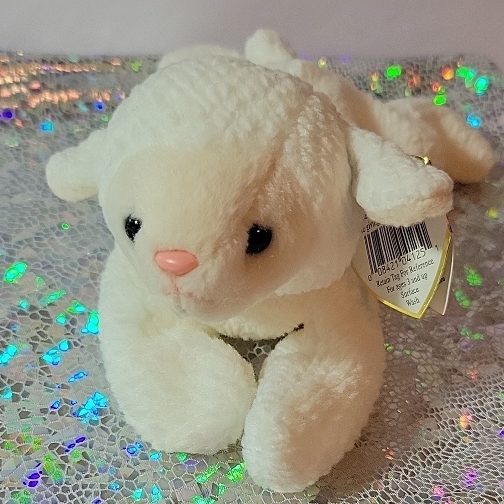 "Fleece" the Lamb is a retired Ty Beanie Baby introduced on January 1, 1997, and
